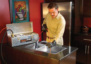 JM-1000 electric water jet in use